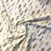 Tissu Jersey Imprimé Plume plie