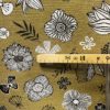 Tissu d'ameublement flower jaune mètre