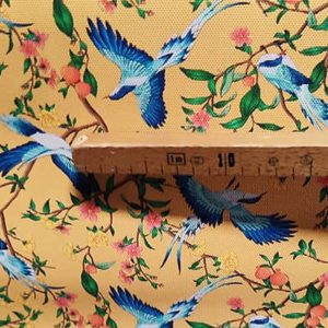 Tissu simili cuir oiseau orange mètre