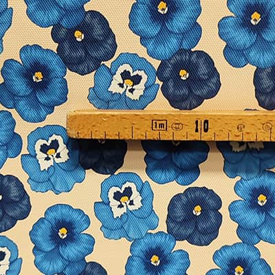 Tissu simili cuir fleurs bleues mètre