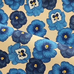 Tissu simili cuir fleurs bleues pli