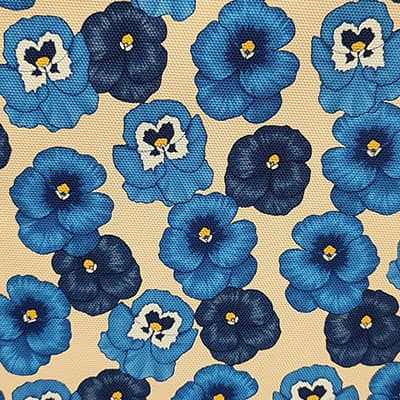 Tissu simili cuir fleurs bleues