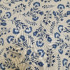 Tissu aspect lin fleur bleue