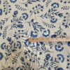 Tissu aspect lin fleur bleue mètre