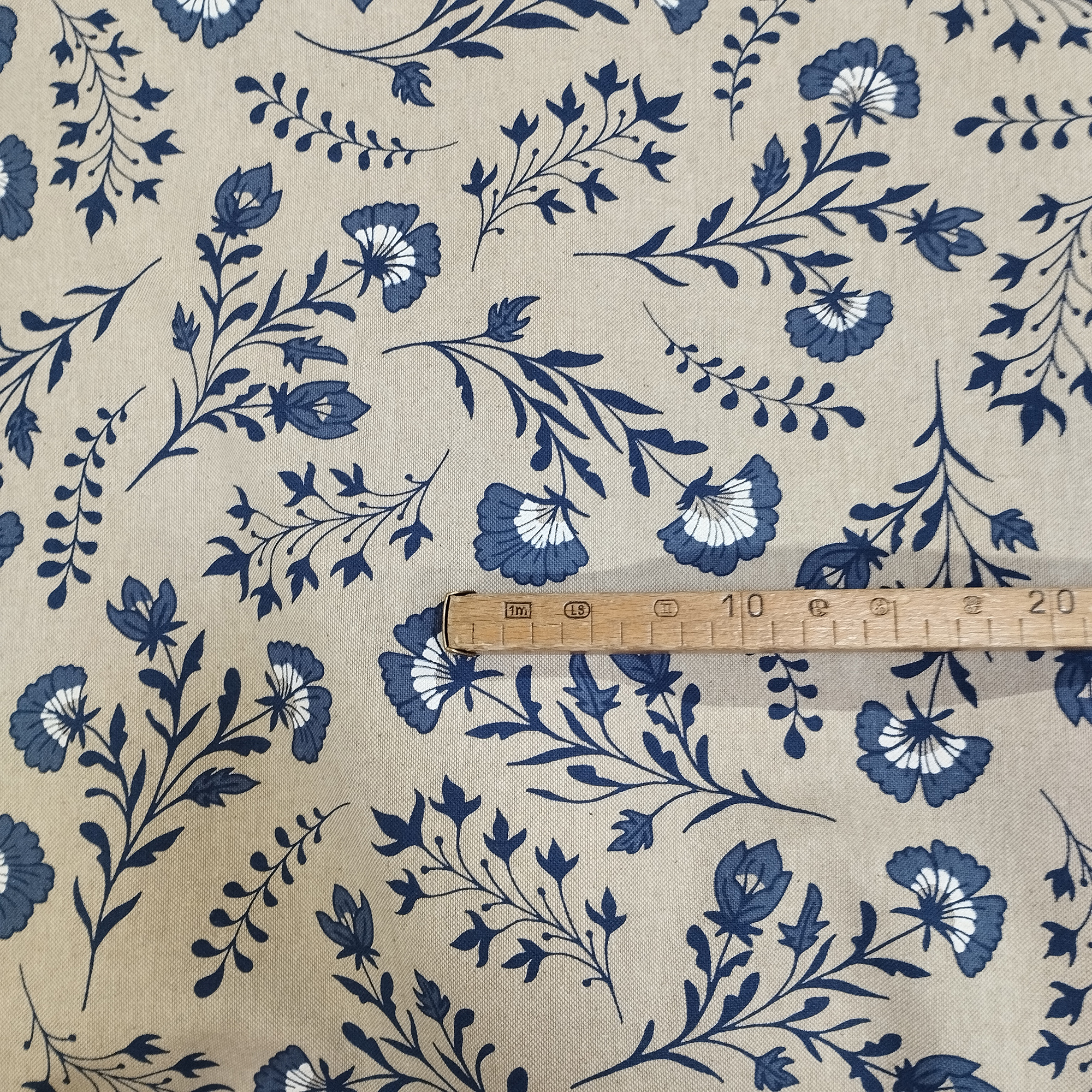 Tissu aspect lin fleur bleue mètre