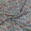 Tissu aspect lin Fleurs fond bleu froissé