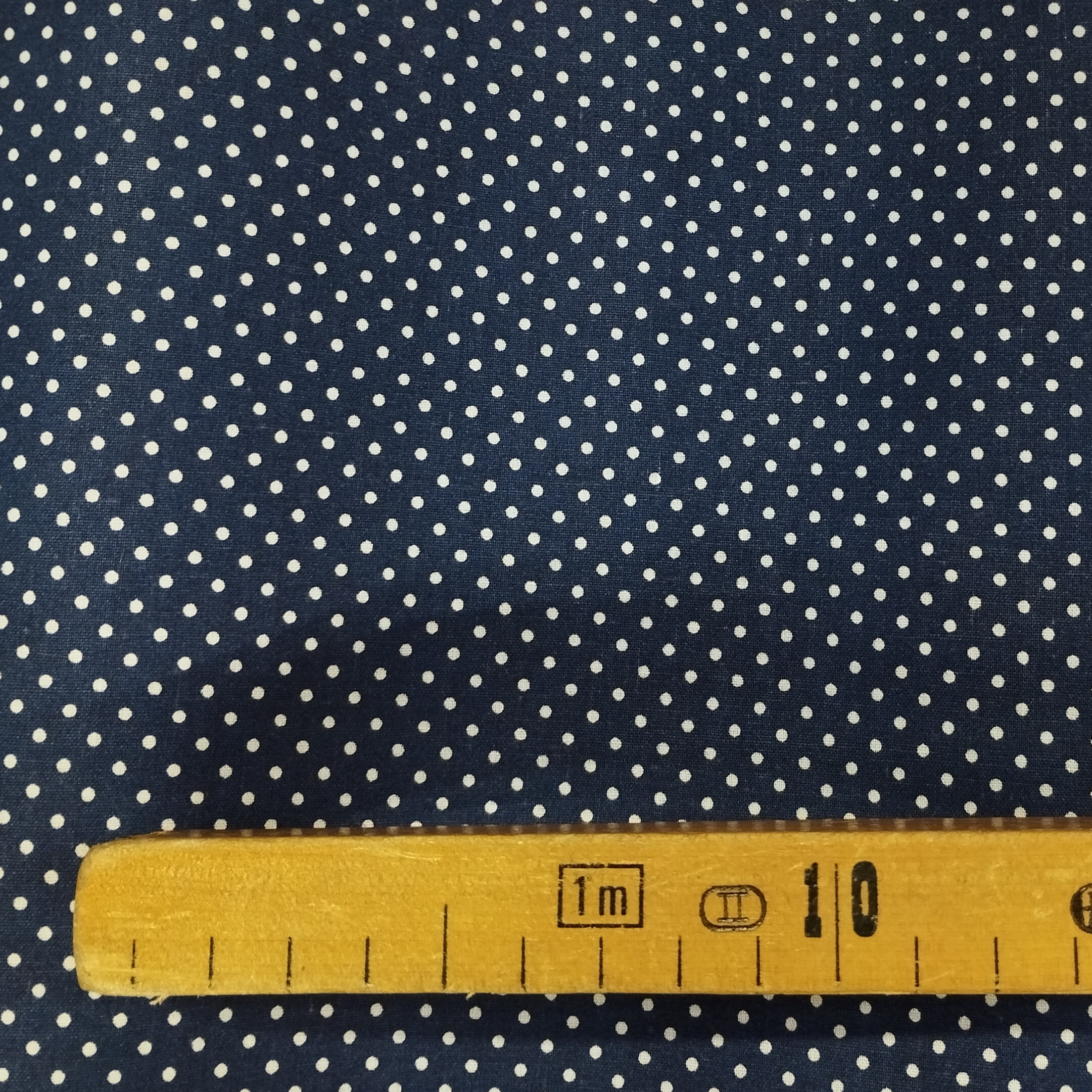 Tissu coton imprimé points bleu marine mètre