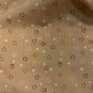 Tissu coton imprimé étoiles orange